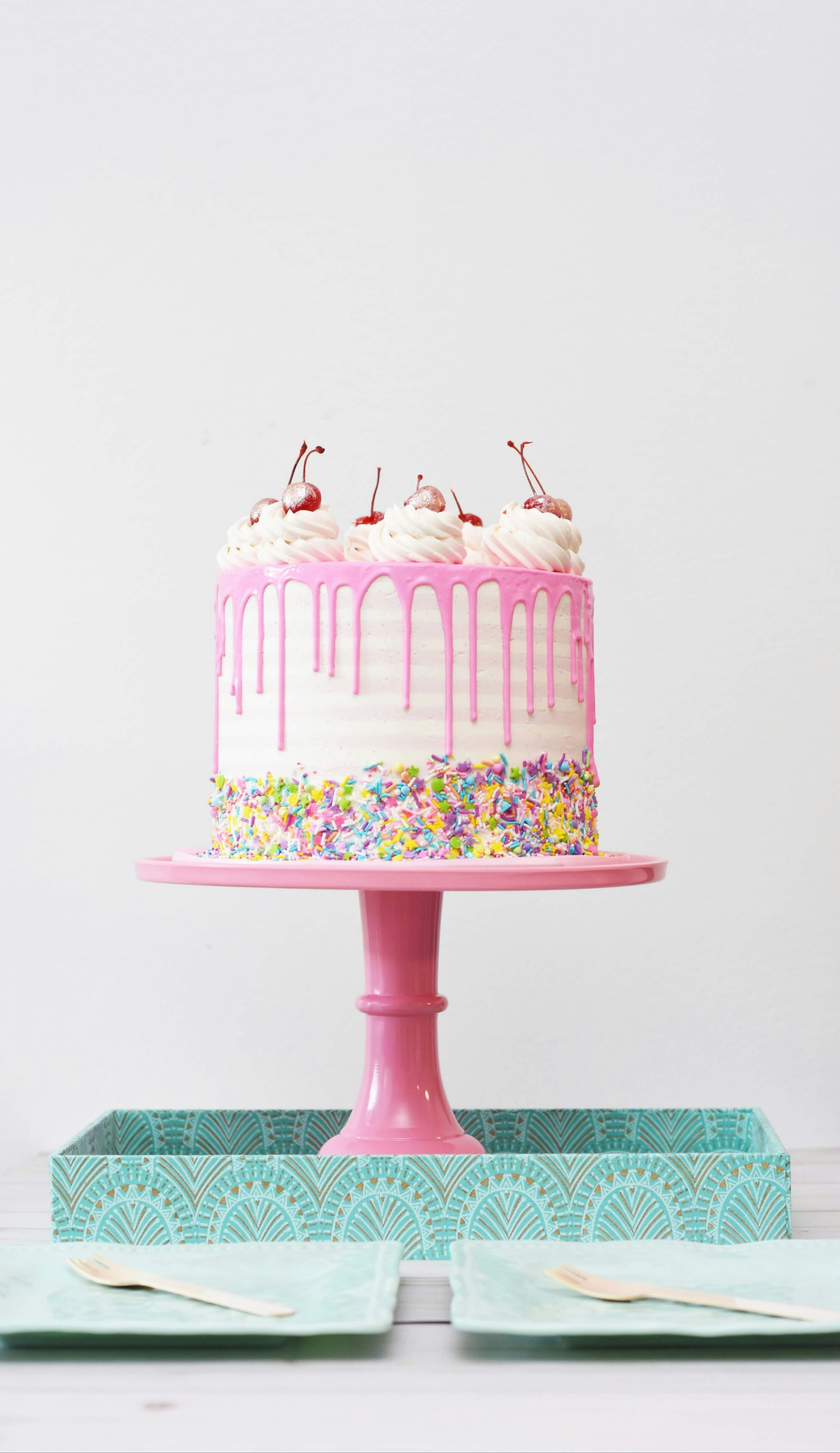 pink cake on a stand