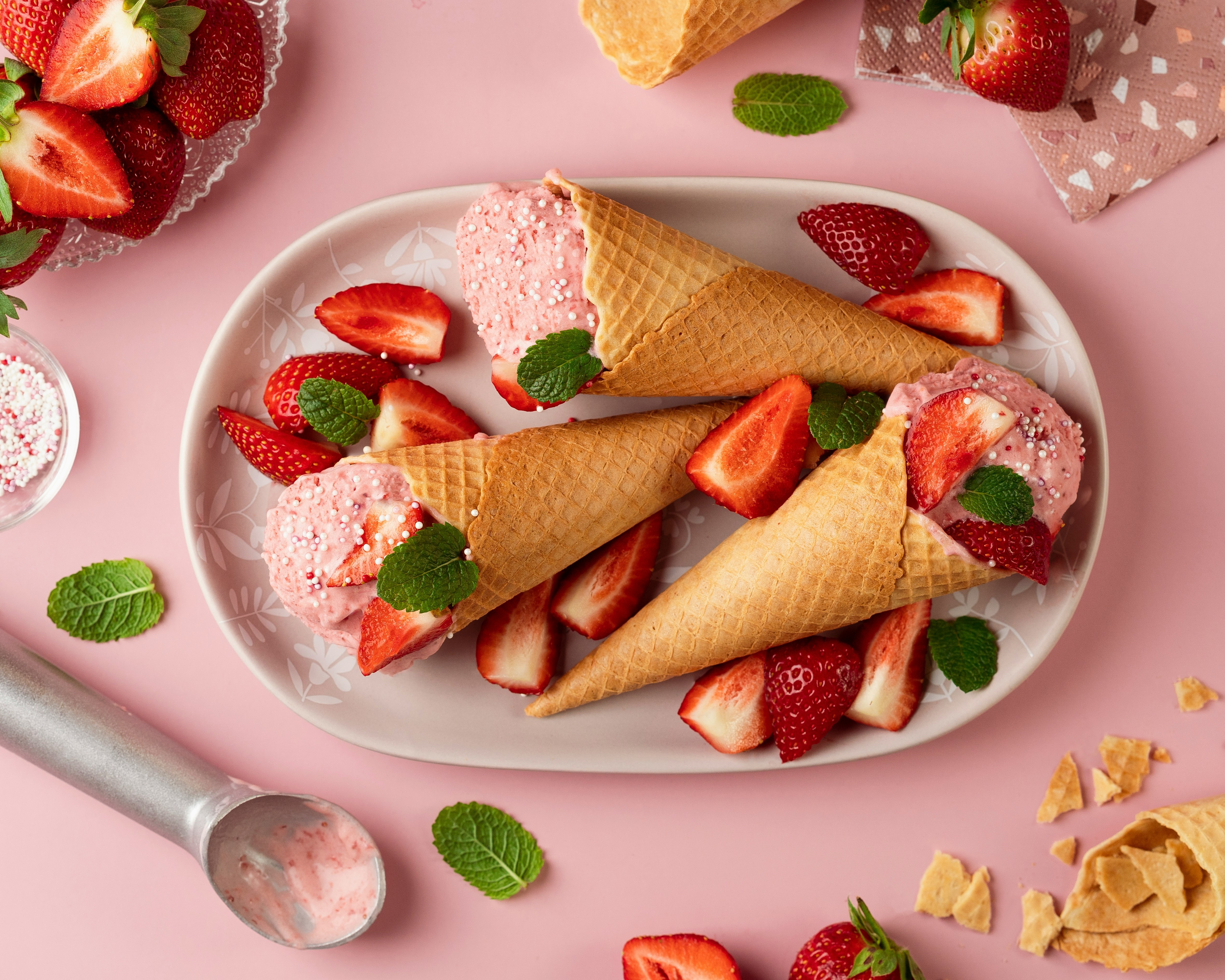 strawberry icecream in waffle cone